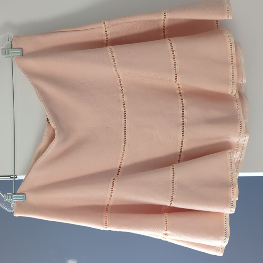 Peach colored Torrid mini skirt. Size 1